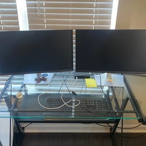 Microsoft surface dock 2, 2 full sized monitors, 1 keyboard, 1 mouse.